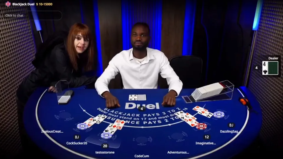 Annika leaning in from the left of a Duel blackjack table while a staff dealer works the shoe