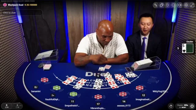 Mike Tyson shuffling cards at Duel Casino live blackjack